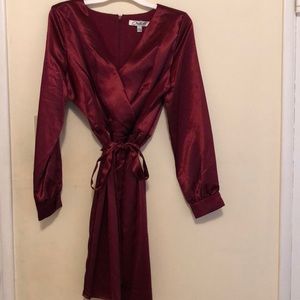 A brand new! Chetta B burgundy long sleeve, back zipper dress